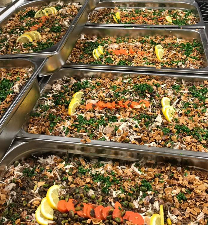 Plats libanais préparés pour une réception à Pantin